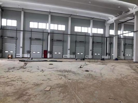 কেনা কাস্টমাইজড আকার উল্লম্ব সেকশনাল দরজা আইসোলেটেড ওভারহেড সেকশনাল দরজা আইএসও 9001 online manufacture